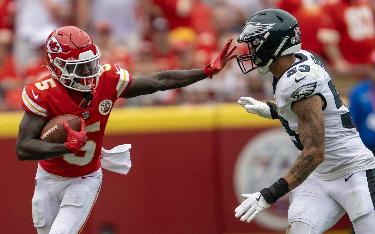 Kansas City Chiefs wide receiver Hollywood Brown (5) pushes past Philadelphia Eagles linebacker Zack Baun (53) in the first half at GEHA Field at Arrowhead Stadium on Sunday, Sept. 14, 2025, in Kansas City.