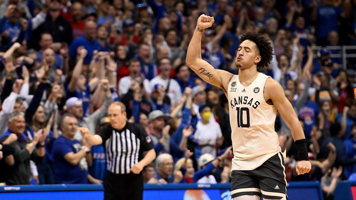 KU’s Jalen Wilson raises his fist after the Jayhawks stopped West Virginia’s last possession during the second half on Feb. 25, 2023, at Allen Fieldhouse. KU beat West Virginia 76-74.