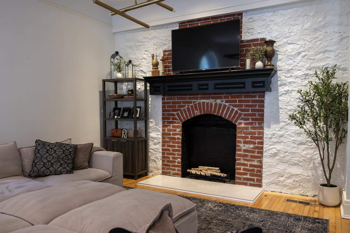 The living room features a fireplace inside the historic Valentine Castle.