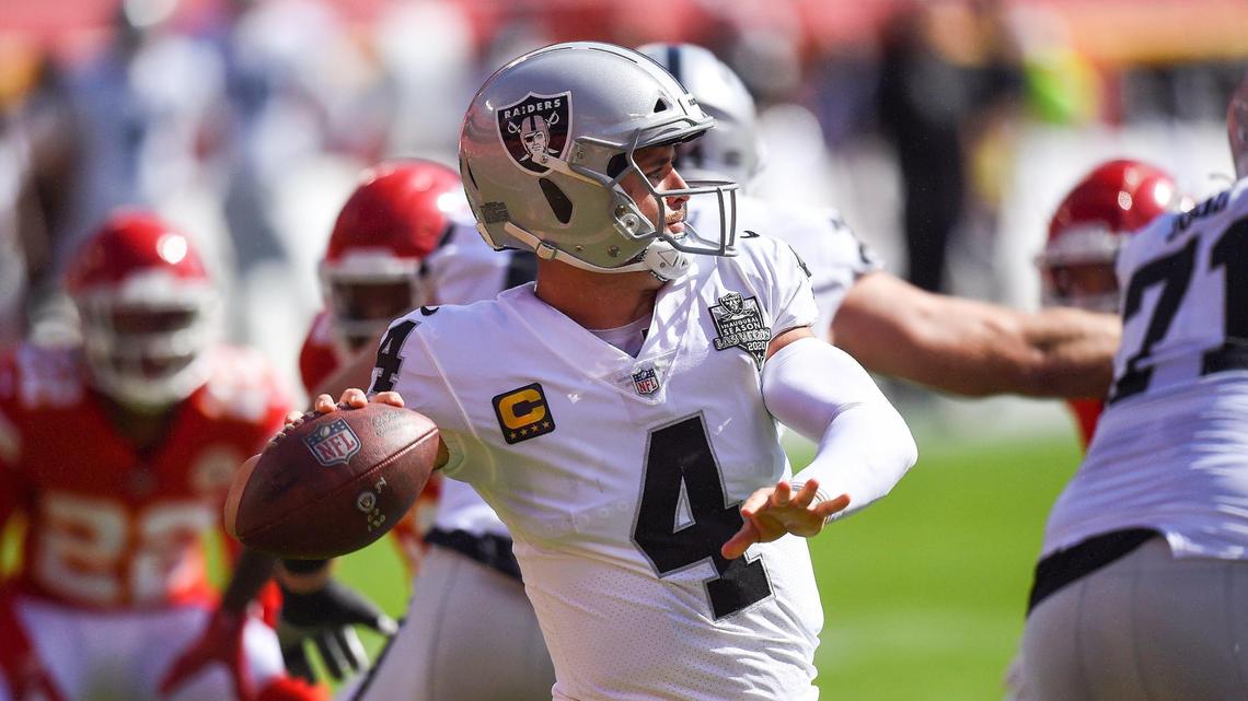 Las Vegas Raiders quarterback Derek Carr looks for an open receiver in the second half against the Kanas City Sunday, October 11, 2020, at Arrowhead Stadium in Kansas City, Missouri.Chiefs