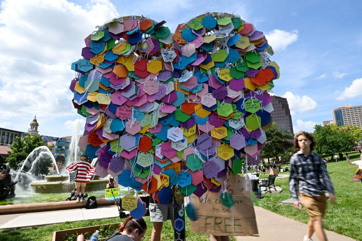An art installation called “Intention Heart” by artist Eugenia Ortiz and was meant to collect the positive intentions of people at the “No Kings” rally on Saturday, June 14, 2025, at Mill Creek Park in Kansas City.