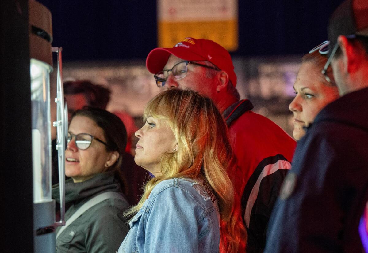 Football fans squeezed in to view Super Bowl Championship rings as they took in the Super Bowl Experience, on Thursday, Feb. 8, 2024, in Las Vegas, Nevada.