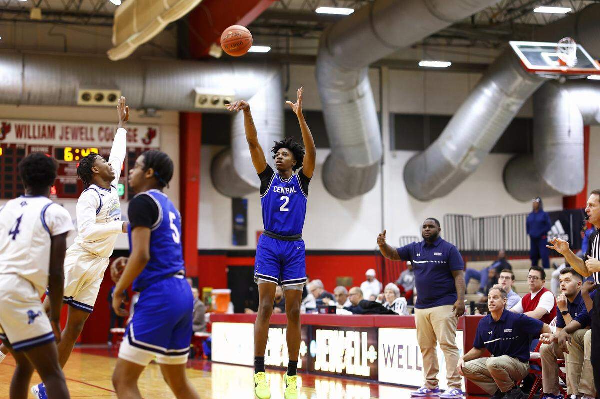 Central’s Brandon Moore launches a 3-point attempt during Friday night’s game against Oak Park at the William Jewell Holiday Classic in Liberty.