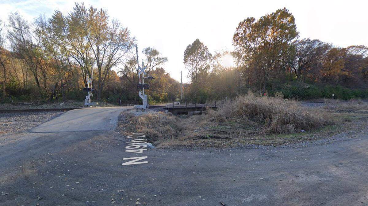 Officers with the Kansas City Kansas Police Department were dispatched to the area of North 49th Drive and Dickinson Road as shown in this Google Maps image. They found a man lying in the road with gunshot wounds who was pronounced dead at the scene.