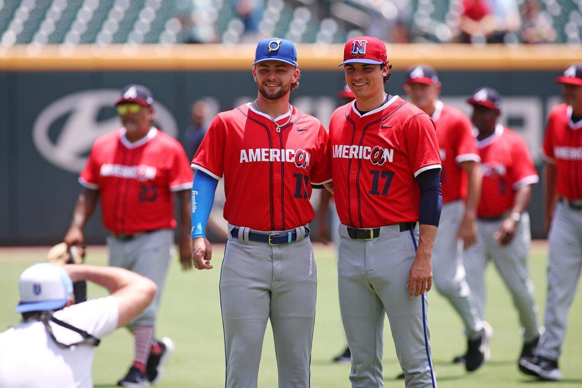 Kansas City Royals prospects Carter Jensen (17) and Frank Mozzicato pose for a photo before the game at Truist Park.