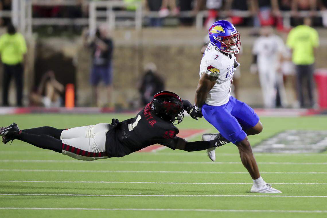 Kansas Jayhawks wide receiver Cam Pickett (7) rushes against Texas Tech Red Raiders defensive back AJ McCarty (1) in the first half at Jones AT&T Stadium on Oct. 11, 2025.