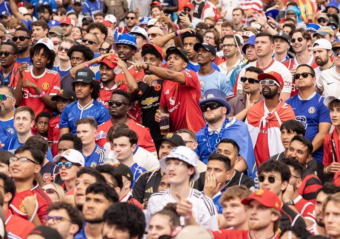 Fans in Kansas City’s Power & Light District look on during the Manchester United-Chelsea match on Saturday, Sept. 20.