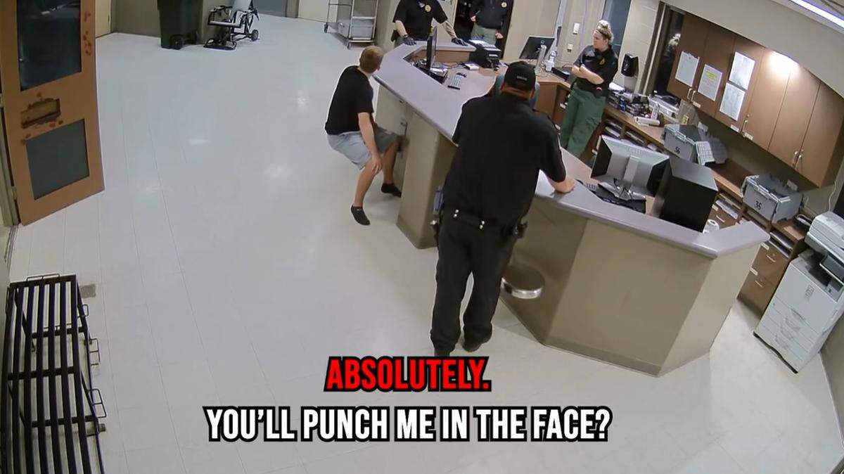 A detention supervisor threatened on video to punch Mason Murphy in the face for asking questions after he was arrested at Sunrise Beach, Missouri.