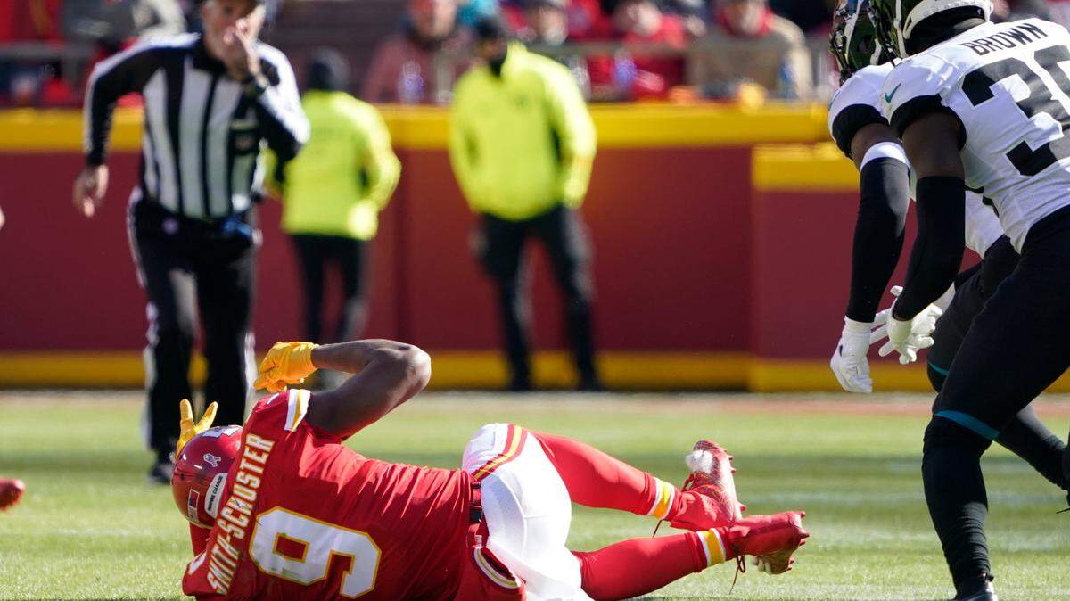 Kansas City Chiefs wide receiver JuJu Smith-Schuster roll on the field after being injured during the first half of an NFL football game against the Jacksonville Jaguars Sunday, Nov. 13, 2022, in Kansas City, Mo. (AP Photo/Ed Zurga)