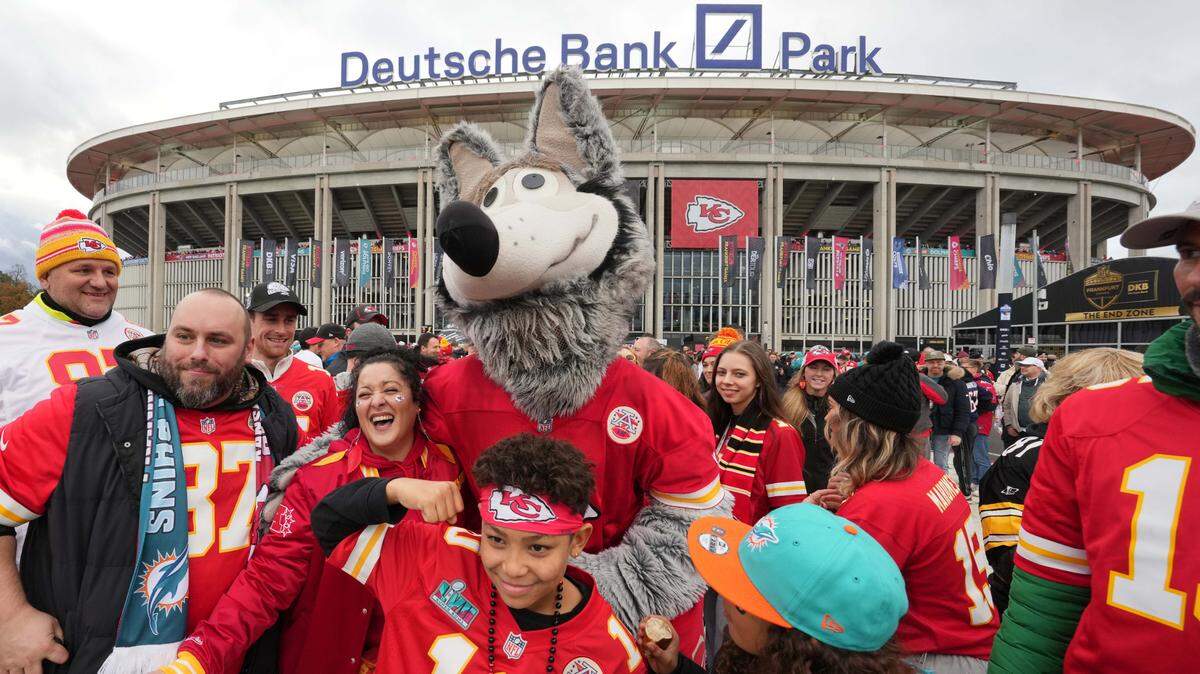 Kansas City Chiefs mascot KC Wolf poses with fans during an NFL International Series game at Deutsche Bank Park.