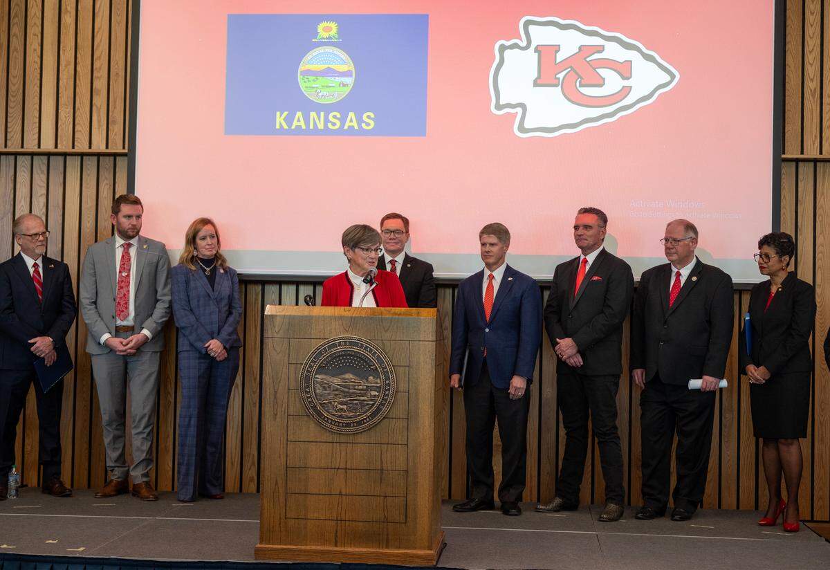 Kansas Governor Laura Kelly announced Monday, Dec. 22, 2025, that the Kansas City Chiefs will build their new stadium in Kansas City, Kansas. Lt. Governor David Toland and Chiefs CEO Clark Hunt and others looked on during the announcement.