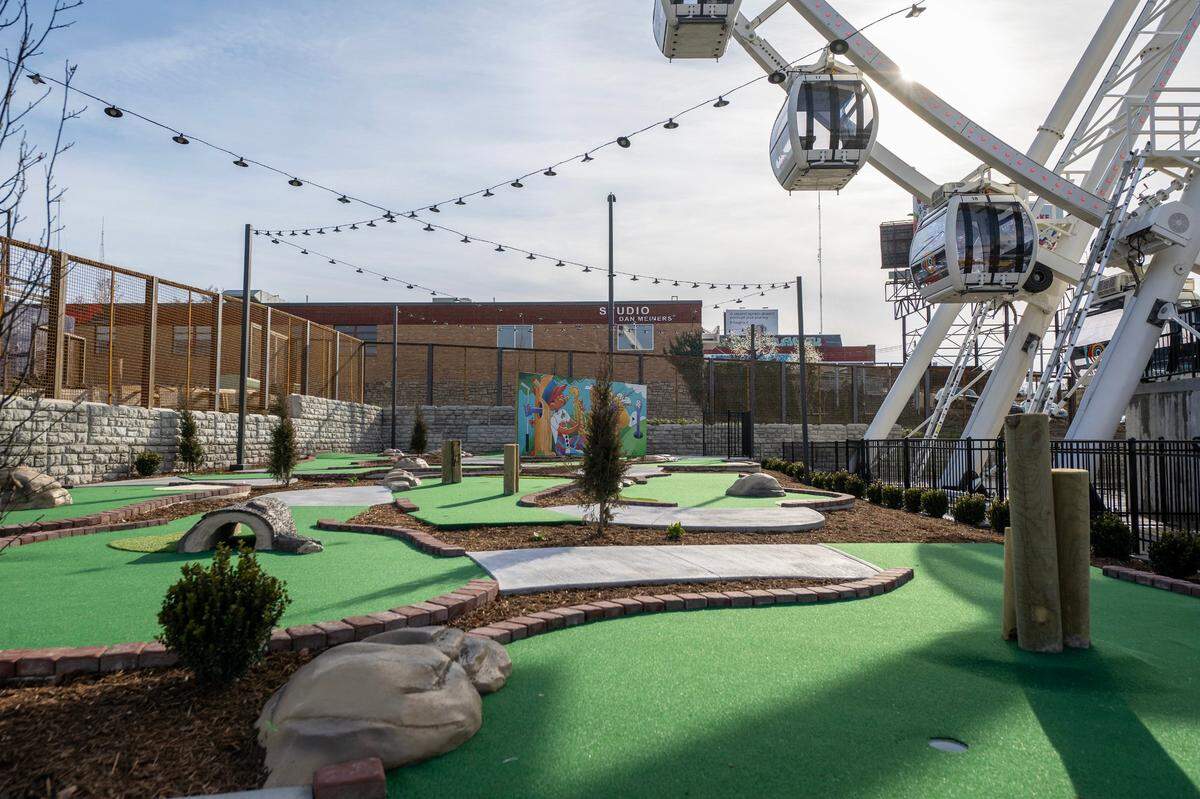 A minigolf course is at the base of the KC Wheel in downtown Kansas City.