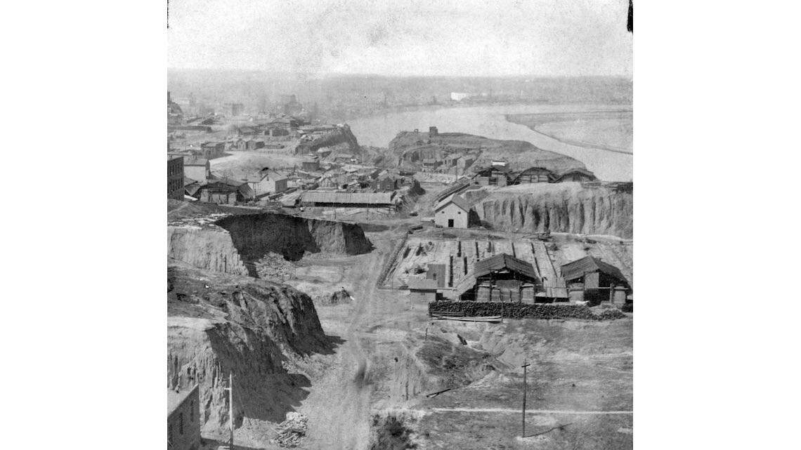 View of the riverfront area facing west and showing the massive street grading project that helped draw Irish immigrants to Kansas City, 1878. Missouri Valley Special Collections, Kansas City Public Library.