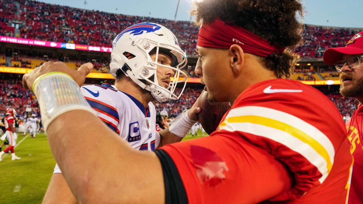 Oct 16, 2022; Kansas City, Missouri, USA; Buffalo Bills quarterback Josh Allen (17) hugs Kansas City Chiefs quarterback Patrick Mahomes (15) after a game at GEHA Field at Arrowhead Stadium. Mandatory Credit: Jay Biggerstaff-USA TODAY Sports