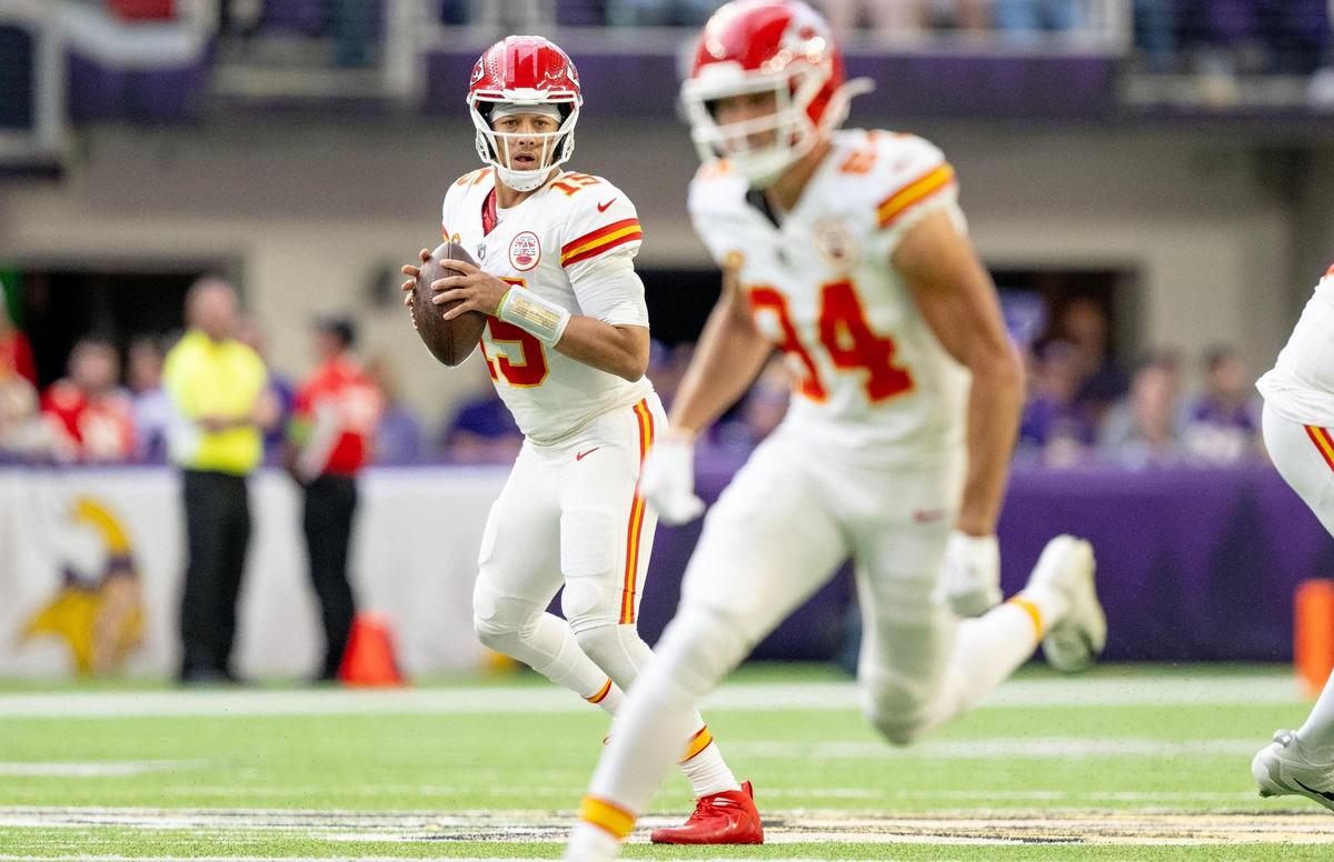 Kansas City Chiefs quarterback Patrick Mahomes (15) looks for an open receiver during an NFL football game against the Minnesota Vikings on Sunday, Oct. 8, 2023, at U.S. Bank Stadium in Minneapolis, Minn.