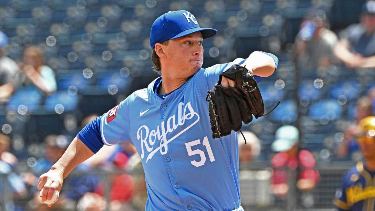 Kansas City Royals starting pitcher Brady Singer (51) delivers a pitch in the first inning against the Milwaukee Brewers at Kauffman Stadium.