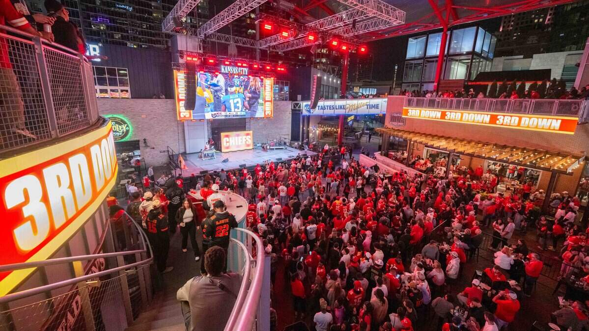 Fans watch the Chiefs season opening game vs. the Los Angeles Chargers, at the KC Live! watch party on Friday, Sep. 5, 2025, in Kansas City Power & Light.