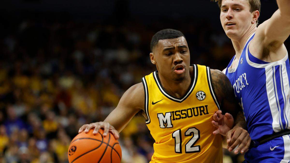 Missouri Tigers guard Tony Perkins (12) drives to the basket against the Kentucky Wildcats during the first half at Mizzou Arena on March 8, 2025.