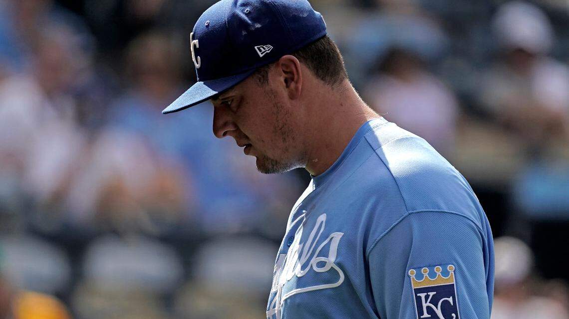 Kansas City Royals starting pitcher Brad Keller walks to the dugout after coming out of the game during the fourth inning of a baseball game against the Oakland Athletics Saturday, June 25, 2022, in Kansas City, Mo. (AP Photo/Charlie Riedel)
