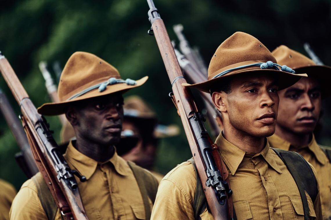 Trai Byers of Kansas City, Kansas, right, stars in Kevin Willmott’s “The 24th,” the true story of the all-black 24th U.S. Infantry during the Houston riots of 1917.
