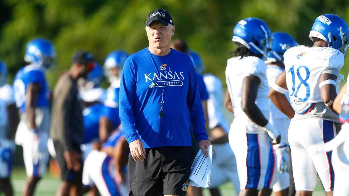 Kansas defensive coordinator Brian Borland walks the field during a 2021 practice.