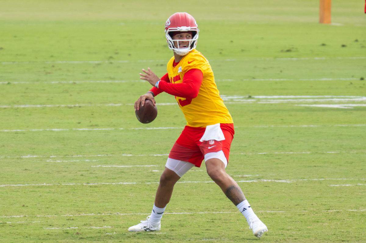 Kansas City Chiefs quarterback Patrick Mahomes (15) winds up for a pass during 7-on-7 drills at Chiefs Training Camp on Sunday, Aug. 3, 2025 in St. Joseph.