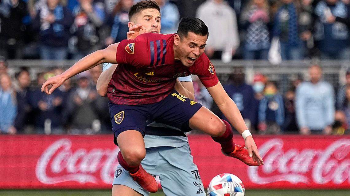 Sporting Kansas City defender Andreu Fontas, behind Real Salt Lake forward Rubio Rubin, battles for the ball during Sunday’s Western Conference Semifinals MLS match in Kansas City, Kan.