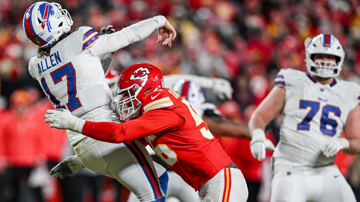 Kansas City Chiefs defensive end George Karlaftis (56) puts a hit on Buffalo Bills quarterback Josh Allen (17) as he gets a pass off late in the fourth quarter during the AFC Championship Game on Sunday, Jan. 26, 2025, at GEHA Field at Arrowhead Stadium.