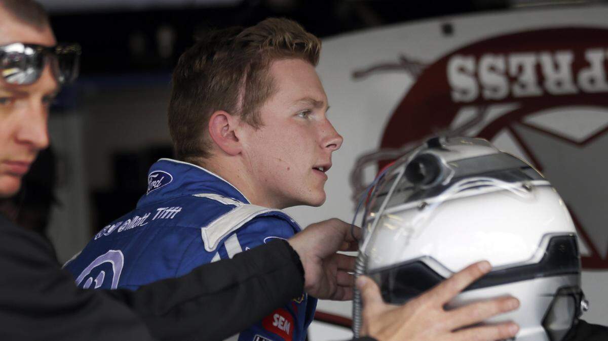 Matt Tifft climbs out of his for a NASCAR Cup Series auto race at Kansas Speedway in Kansas City, Kan., Friday, May 10, 2019. Tifft underwent surgery to remove a low-grade benign brain tumor in 2016. (AP Photo/Orlin Wagner)