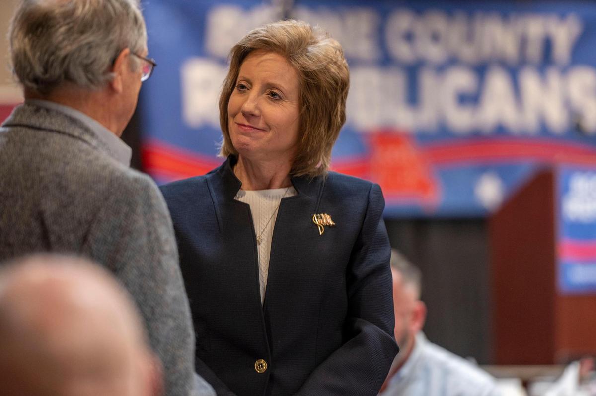 Congresswoman Vicky Hartzler speaks to a guest at the Boone County Lincoln Days banquet at a hotel in Columbia, Missouri on April 8. Several Republican candidates who are running for the upcoming August primary elections attended and spoke during the banquet, which was hosted by the Boone County Republican Central Committee.