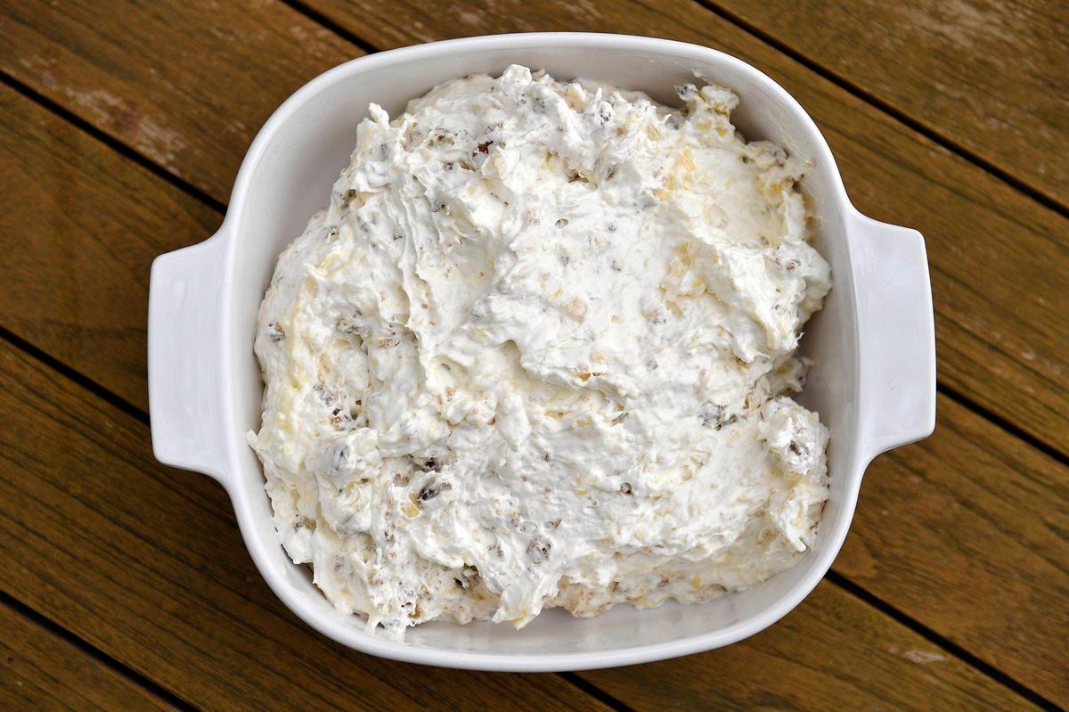 Cream cheese and frozen whipped topping are the secrets to this pretzel salad.
