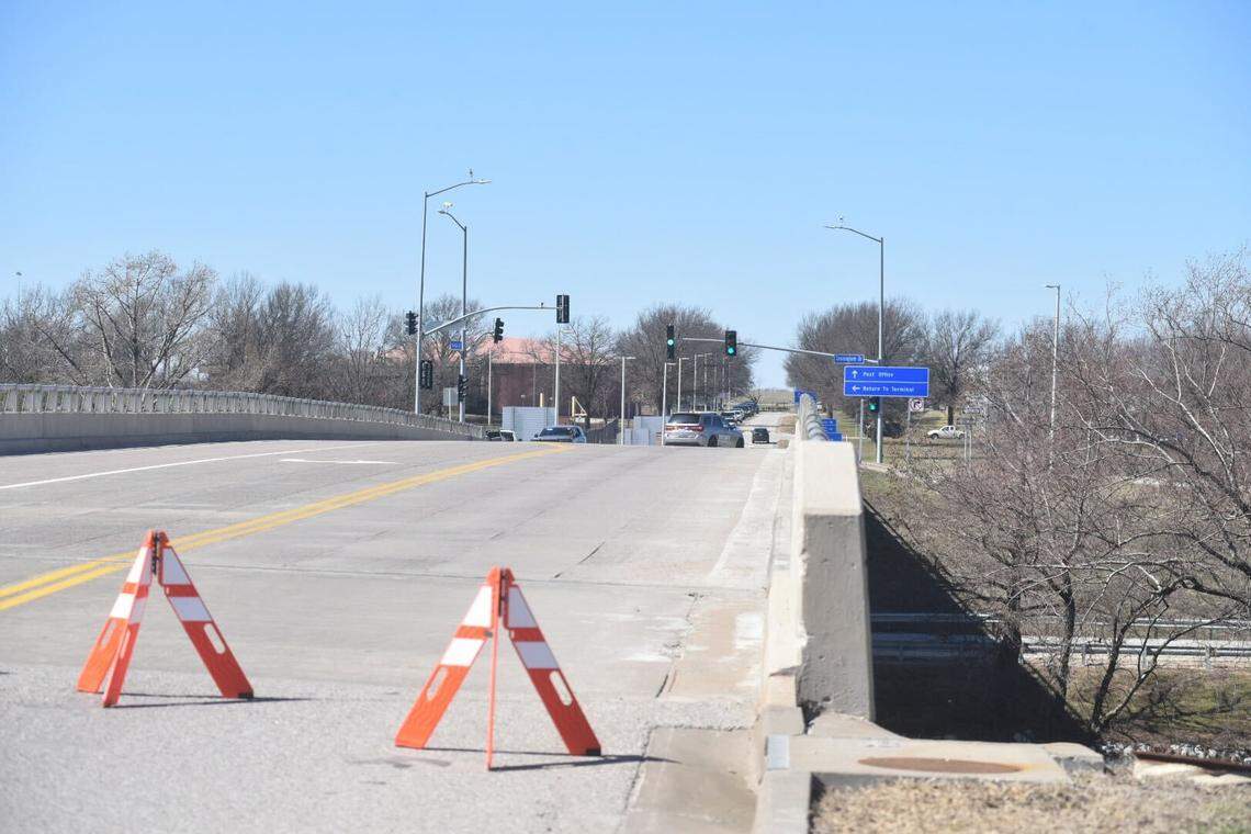 A ramp leading to Cunningham Drive over I-29 is blocked off on Sunday, March 8, as airport officials investigate a potential threat.