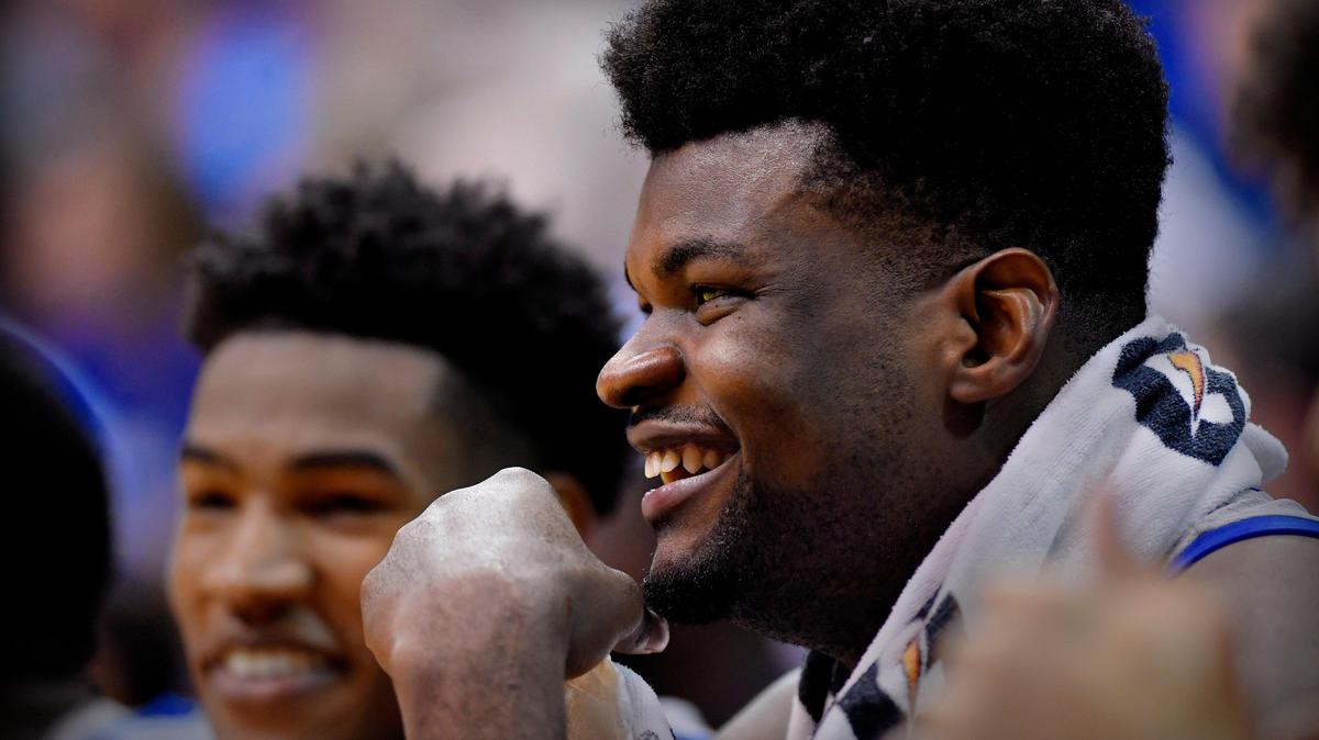 After pouring in 19 points, grabbing 16 rebounds and blocking 3 shots in minutes, KU’s Udoka Azubuike shared a laugh with teammate Ochai Agbaji during the second half of a win over Oklahoma State in 2020.
