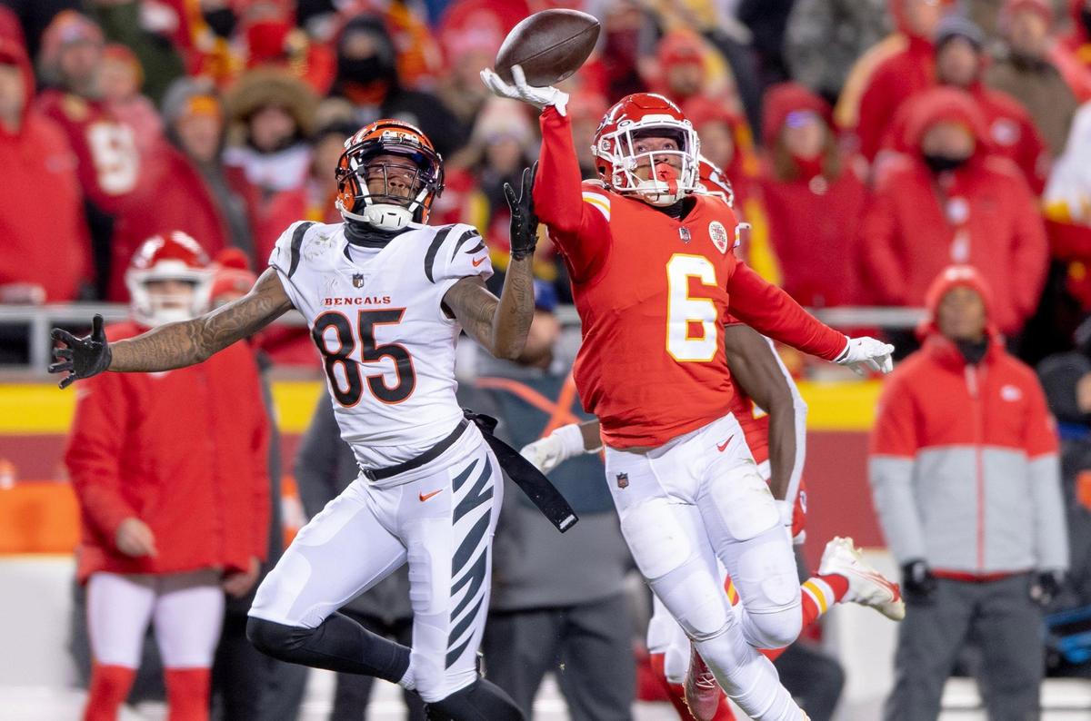 Kansas City Chiefs safety Bryan Cook (6) deflects a pass intended for Cincinnati Bengals wide receiver Tee Higgins (85) during the AFC Championship NFL football game at GEHA Field at Arrowhead Stadium on Sunday, Jan. 29, 2023, in Kansas City.