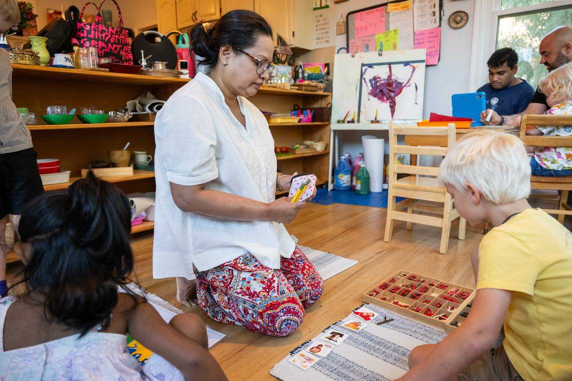Buddhika Kimmanthudawa teaches young children at her in-home, licensed Montessori school on Thursday, October 16, 2025, in Leawood. Kimmanthudawa is facing legal threats from her HOA because of parking, traffic complaints and HOA is claiming that she can't operate a business in the HOA.