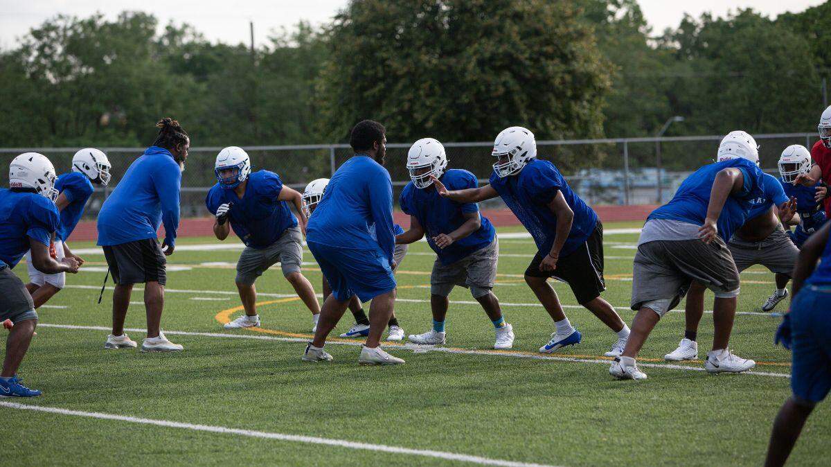 Central High School students prepare for the fall football season. Central has its own football team this year after going on hiatus last season. (Vaughn Wheat/The Beacon)