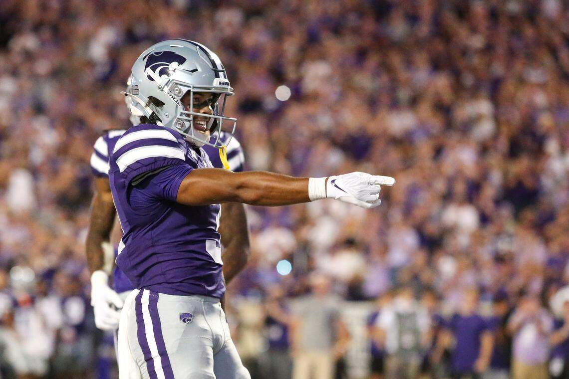 Kansas State Wildcats running back Dylan Edwards (3) celebrates a touchdown in the third quarter against the Tennessee-Martin Skyhawks at Bill Snyder Family Football Stadium on Aug. 31, 2024.