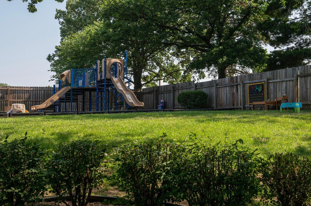 A children’s playground is seen outside at Newhouse on Tuesday, June 20, 2023, in Kansas City.