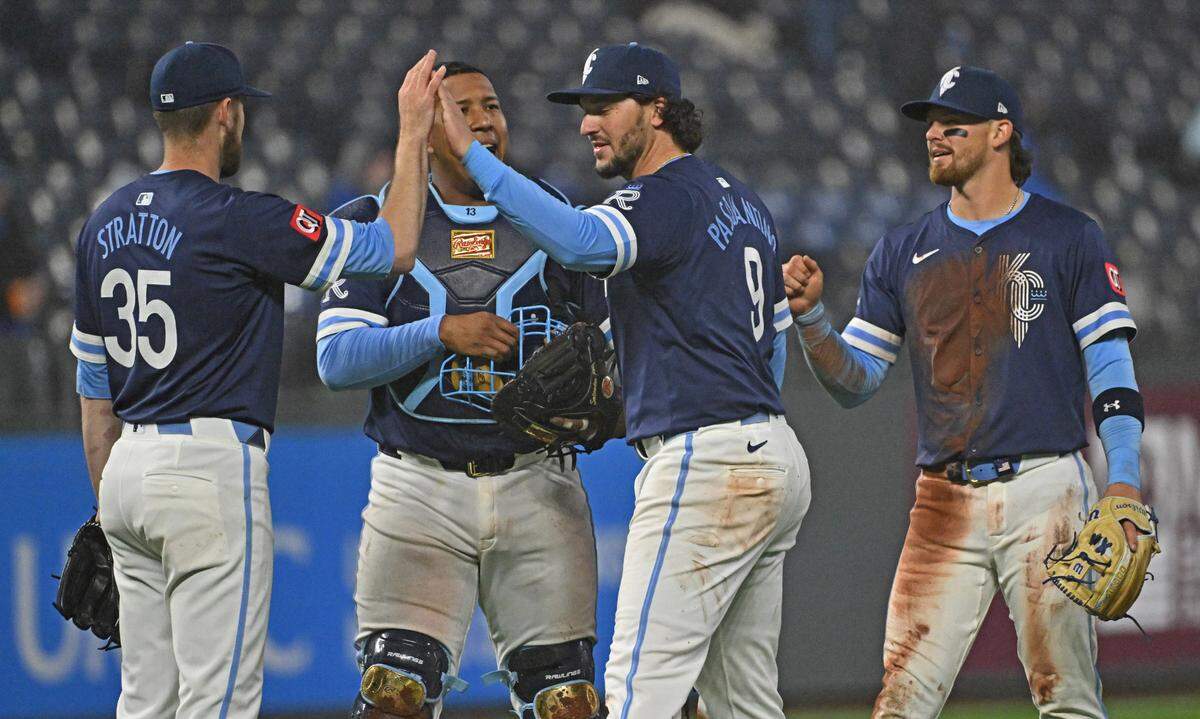 Kansas City Royals players Vinnie Pasquantino (9), Chris Stratton (35), Salvador Perez (13) and Bobby Witt Jr. (7) celebrate after beating the Baltimore Orioles at Kauffman Stadium on Apr 4, 2025 in Kansas City, Missouri, USA.