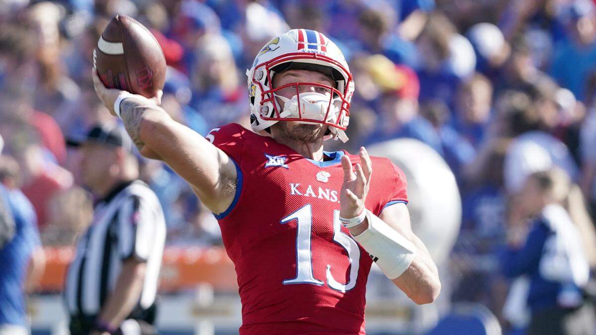Kansas Jayhawks quarterback Ethan Vasko (15) warms up against the Duke Blue Devils prior to the game at David Booth Kansas Memorial Stadium on Sept. 24, 2022.