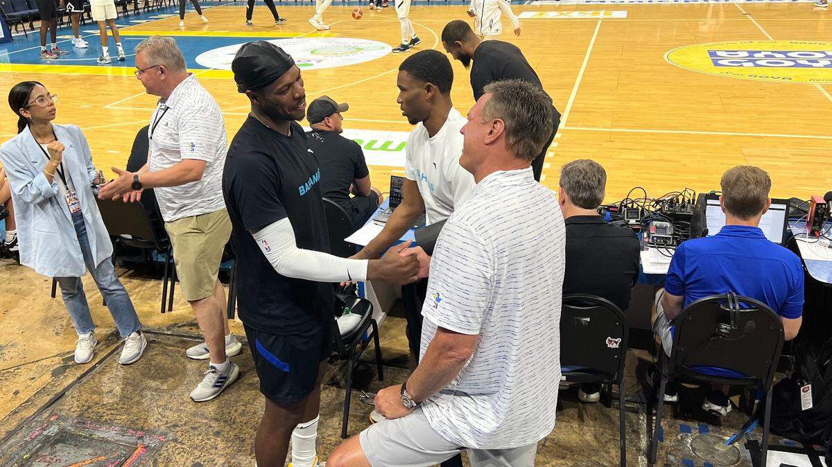 Buddy Hield, left, visits with KU coach Bill Self before KU’s exhibition game with the Bahamian National Team on Aug. 5, 2023.