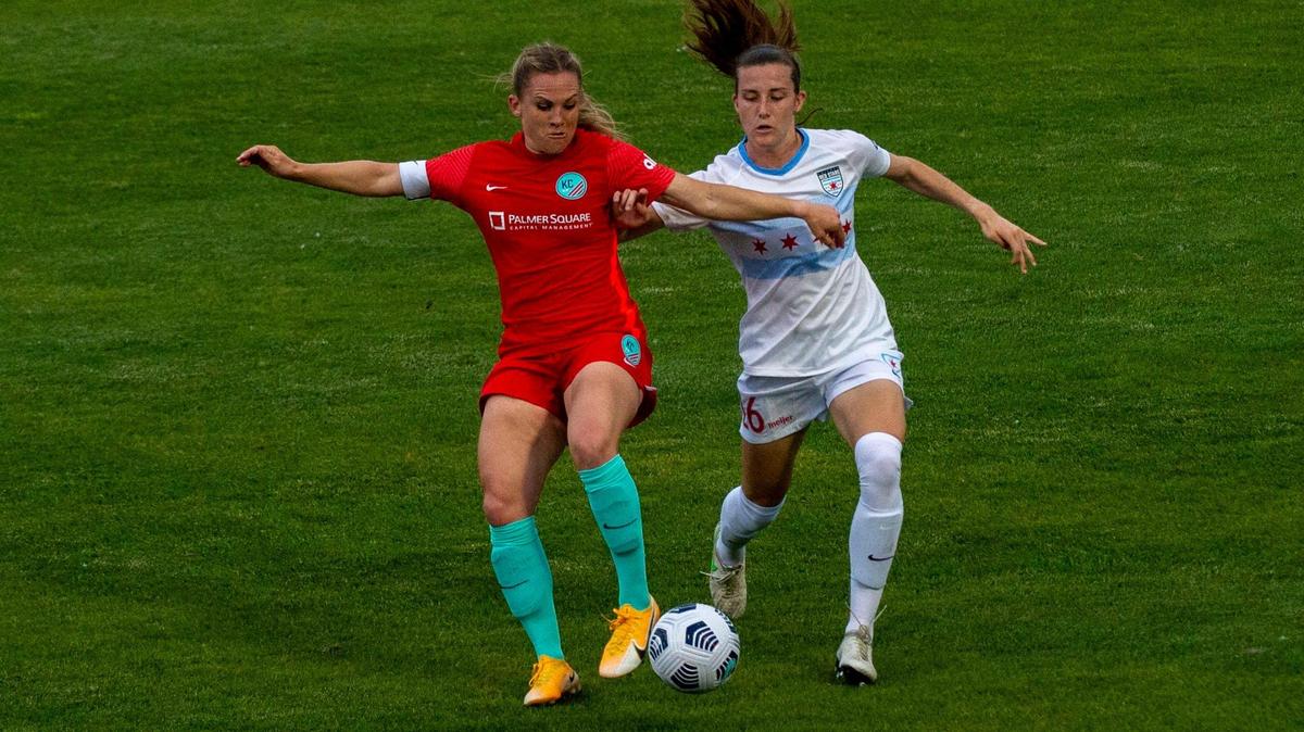 Kansas City’s Amy Rodriguez (8) battles for the ball against Chicago Red Stars’s Julie Ertz (8) during the first half of the gam between the Kansas City and the Chicago Red Stars, Wednesday, May 26, 2021 at Legends Field in Kansas City, Kansas. Kansas City lost to Chicago 1-2