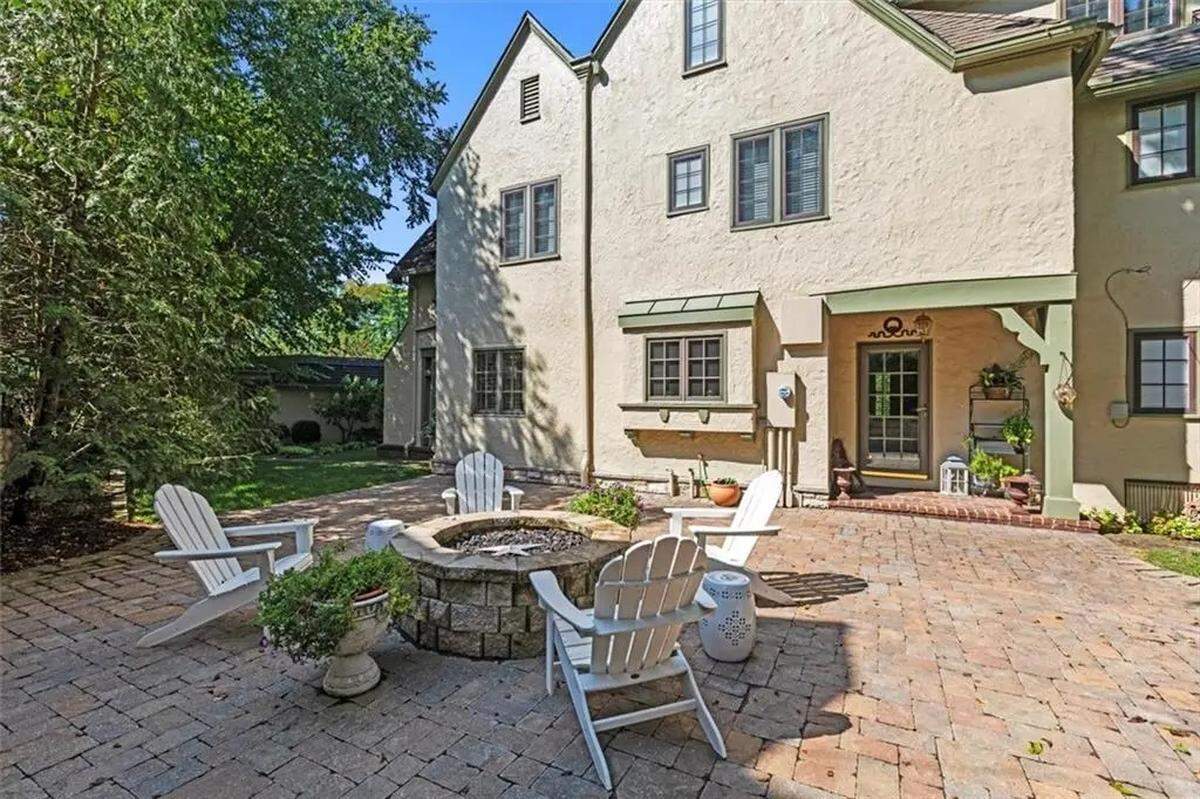 A firepit sits behind a century-old home in Kansas City at 1234 W. 58th St., located near Ward Parkway and Mission Hills.