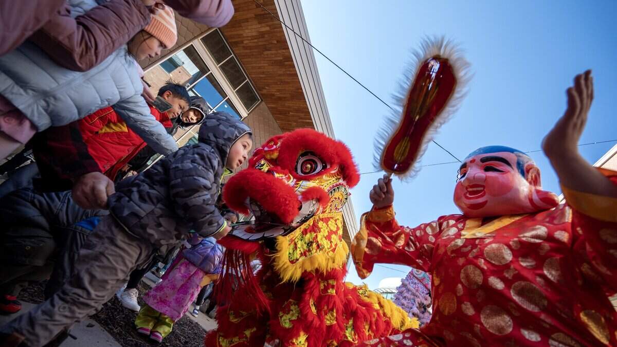 Th?n Phúc Lion Dance team perform during a Lunar New Year celebration at the Lenexa Public Market on Sunday, Feb. 22, 2026, in Lenexa.