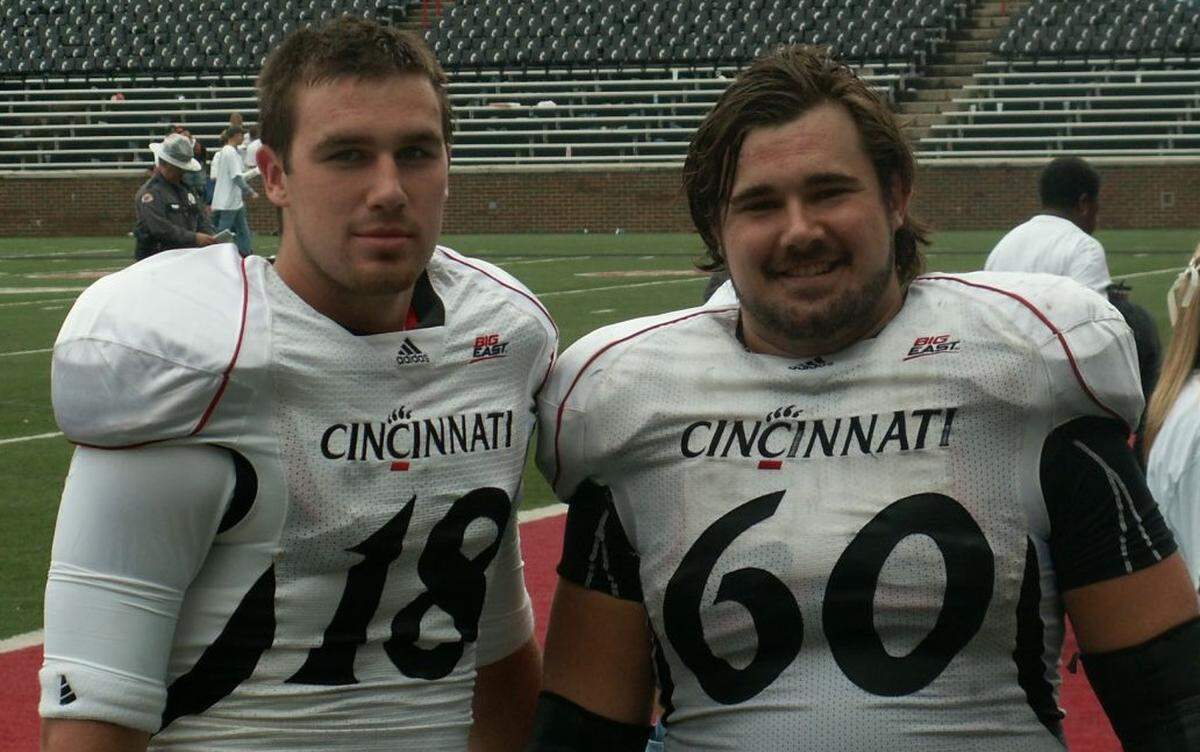 Travis Kelce, left, and older brother Jason Kelce, right, were teammates in college at Cincinnati. At one point, Jason threw his younger sib a lifeline that helped keep his football career on track.