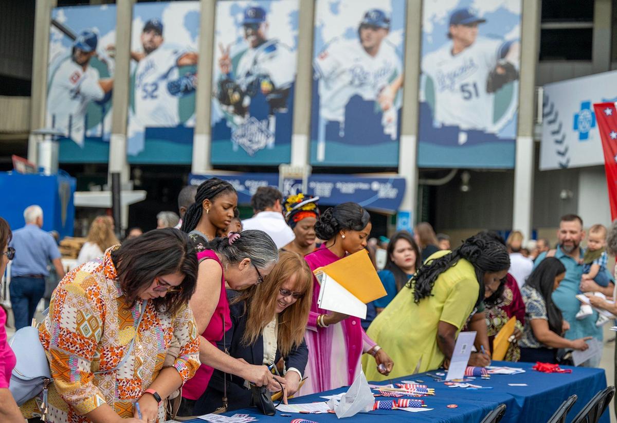 Following a naturalization ceremony, the League of Women Voters was present to register eligible voters. Citizens from more than 95 countries took the oath of U.S. citizenship during the official ceremony held at Kauffman Stadium in Kansas City on Thursday, Sept. 12, 2024.