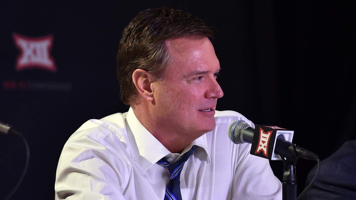 Kansas coach Bill Self answers questions from media after a game against the Kansas State Wildcats during the Big 12 Tournament at Sprint Center (now T-Mobile Center) on March 10, 2016.