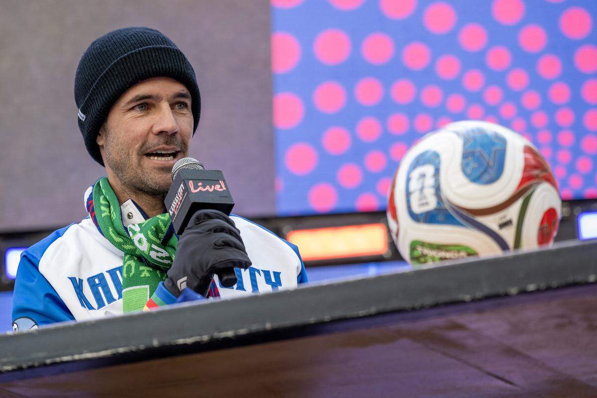Former Sporting Kansas City player Benny Feilhaber makes a guest appearance during the FIFA World Cup draw watch party at the Power & Light District on Friday, Dec. 5, 2025, in Kansas City.