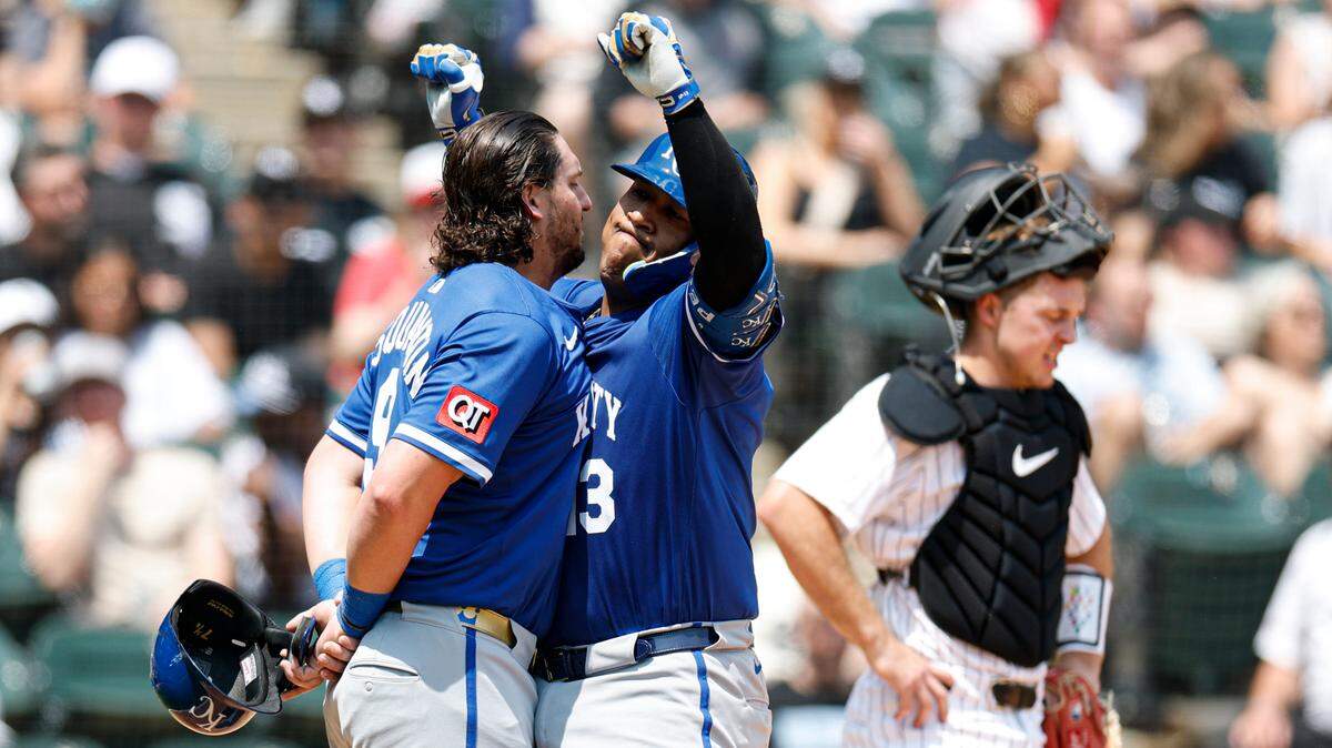 Kansas City’s Vinnie Pasquantino, left, congratulates Royals teammate Salvador Perez on the latter’s fourth-inning home run during a Sunday, June 8, 2025 Major League Baseball game against the White Sox at Rate Field in Chicago.
