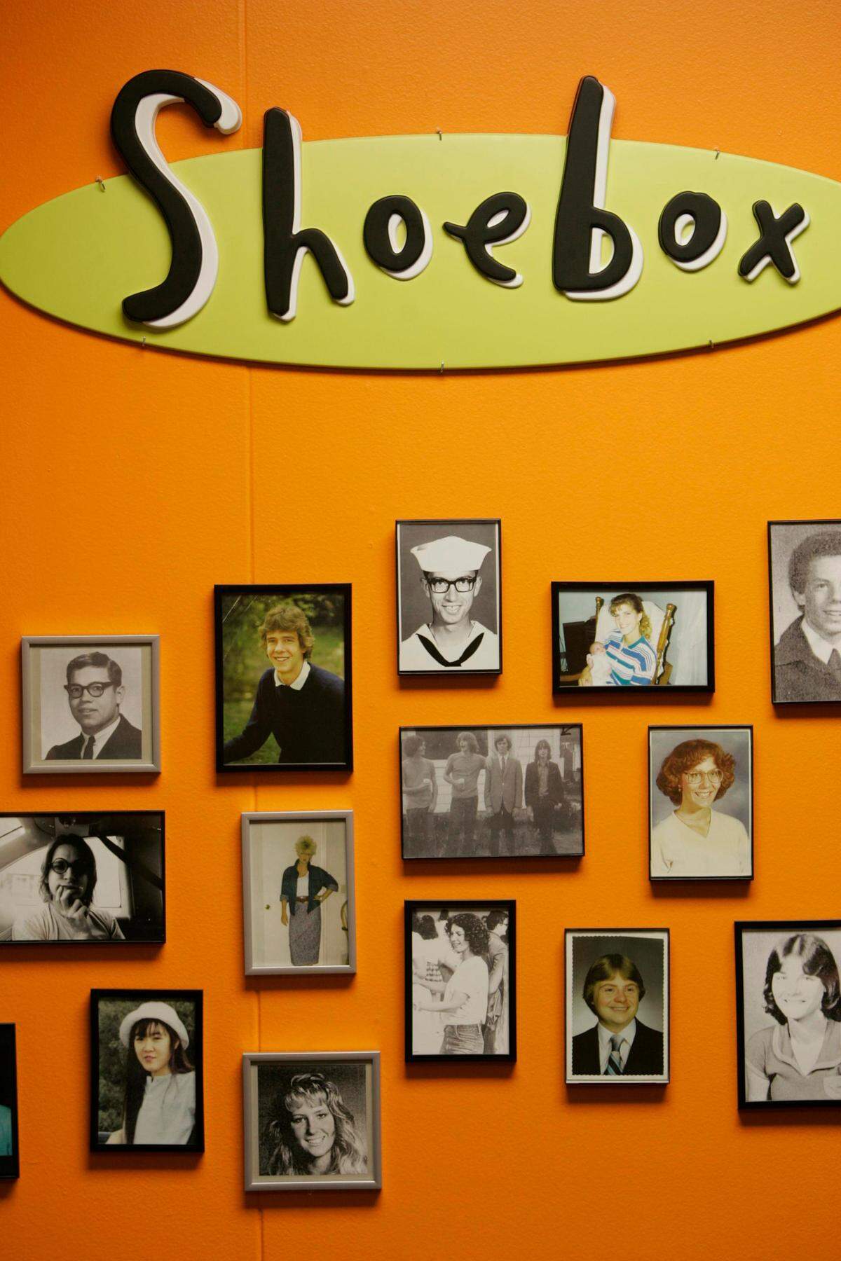 Hallmark’s Mother’s Day team works a year ahead, brainstorming in the Shoebox division. Employees hang photos of themselves at age 18 as part of the creative process.